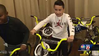 Priceless reaction - a third grader has when he finds out he is getting a new bike.